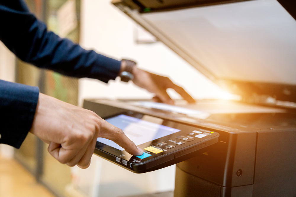 Man with Photocopier