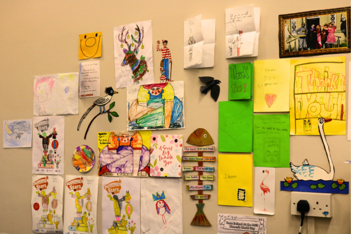 A display of  children's artwork gifted to the library from patrons